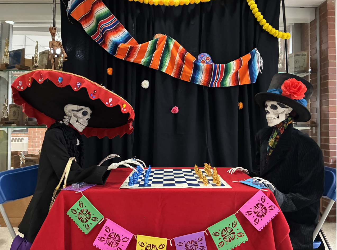 A festive Día de los Muertos display greeted players as they entered HPHS.