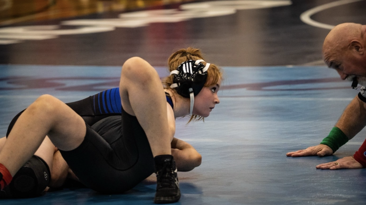 Junior Riley Moore winning her match.