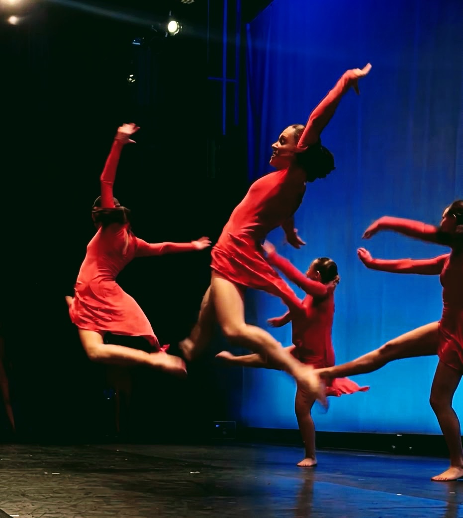 The dance “In Company” is performed by (from left to right): Mia Pearl, Zoe Zechman, Eden Gunsberg, and Lily Bender.